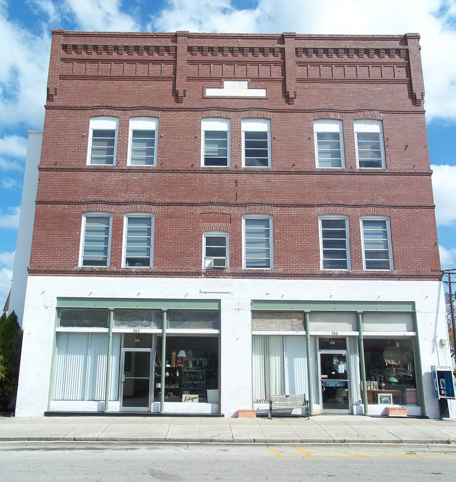 Historic downtown Oak Street, 1914 building, square panorama.