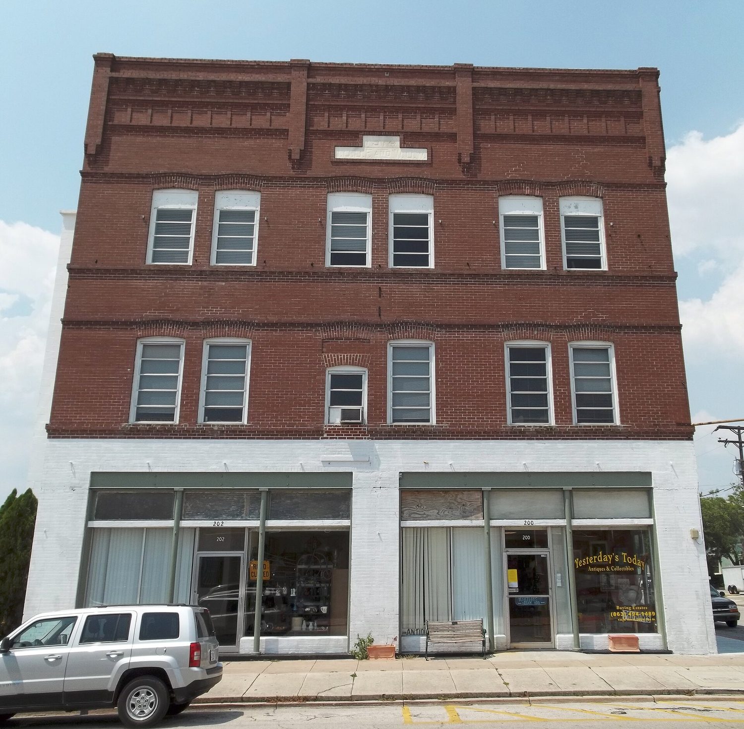Historic downtown Oak Street, 1914 building, square panorama.